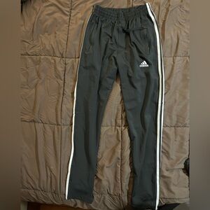 Black Adidas track pants